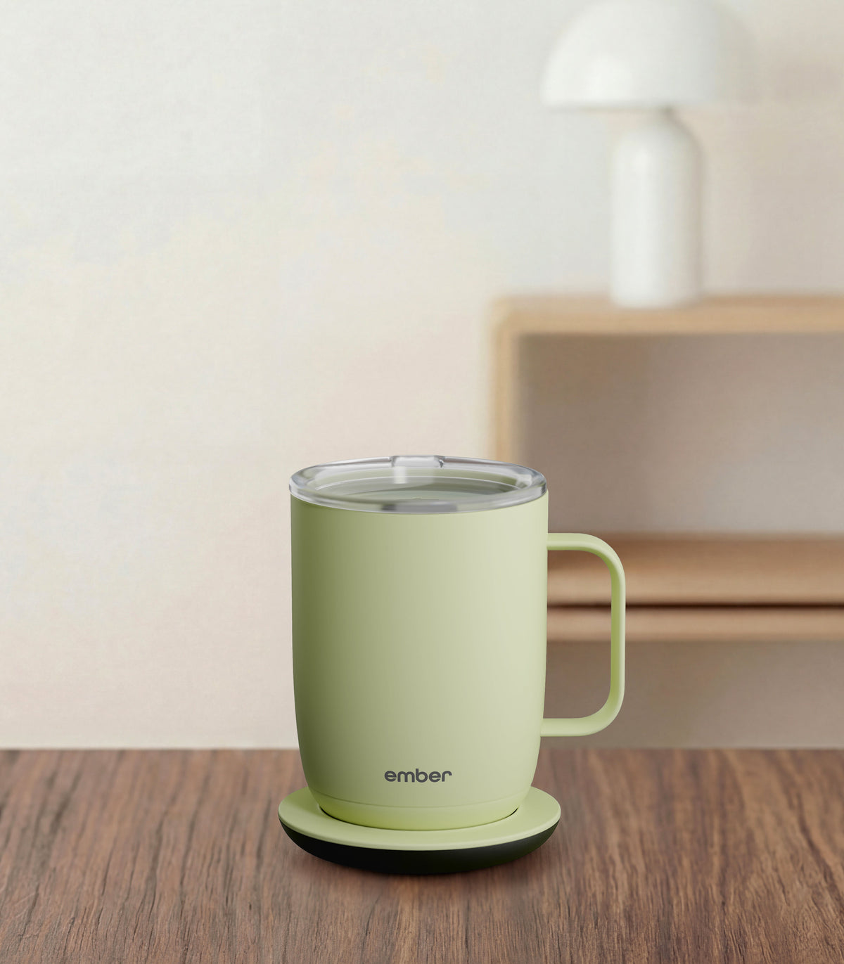 Ember Mug 3 in Matcha Green, 14 oz, on a desk