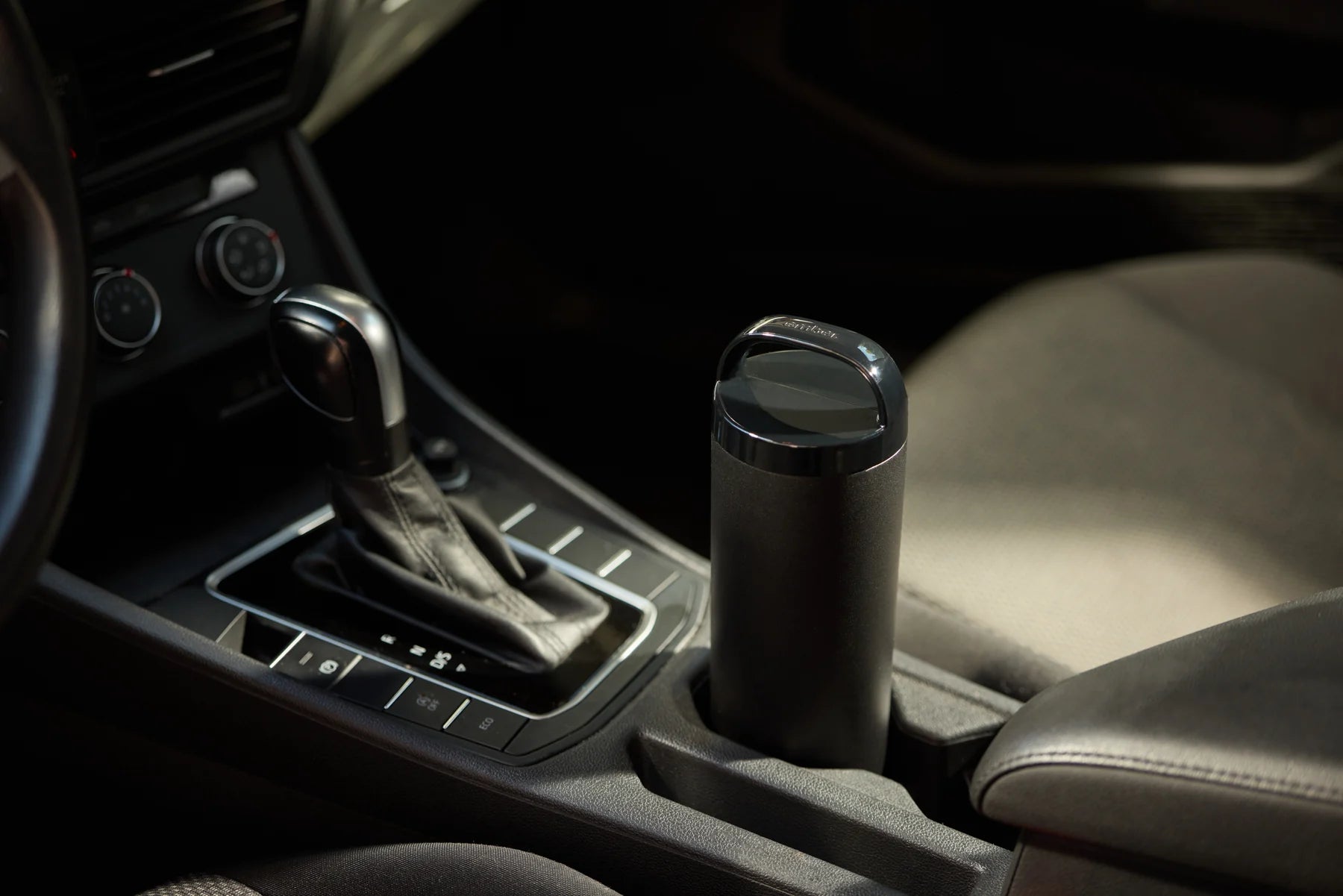 Black Tumbler 2 in a car cupholder